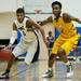 Pioneer senior Duane Simpson-Redmond drives in the game against Ypsilanti on Monday, March 4. Daniel Brenner I AnnArbor.com